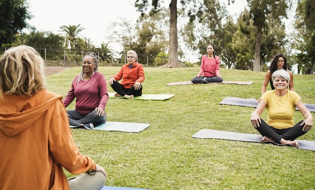 people-doing-yoga-class-keeping-social-distance-city-park_166273-1191.jpg